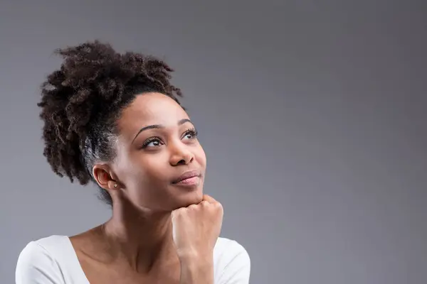 Dreamy Gaze Thoughtful Pose Woman Updo Hair Complements Her Hopeful — Stock Photo, Image