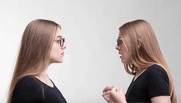 Identical Women Engage Silent Debate Expressions Locked Communication — Stock Photo, Image