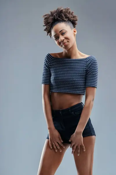 Young Woman Striped Crop Top Shorts Shares Coy Look Her — Stock Photo, Image