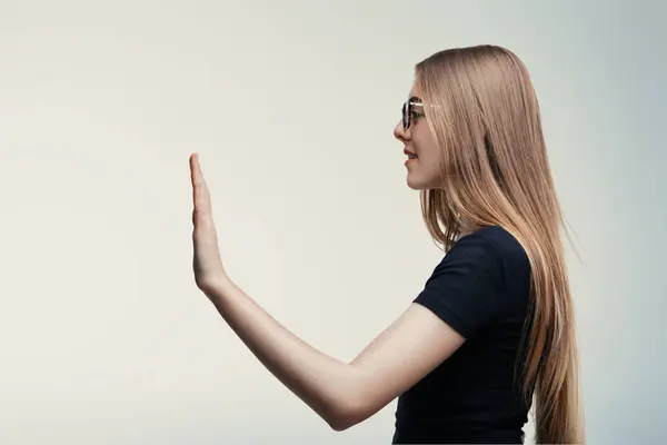 stock image Versatile gesture from a woman, possibly a greeting, high-five, or oath-taking stance