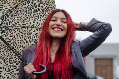 girl on the street with umbrella