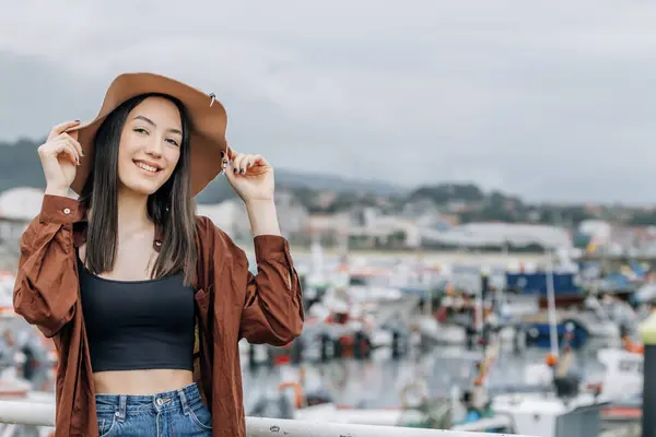 stock image happy tourist woman on vacation at marina