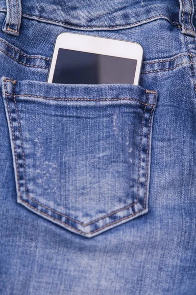 mobile phone in jeans pocket