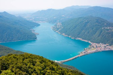 Beautiful big mountain lake with a bridge in Switzerland