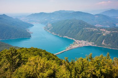 Beautiful big mountain lake with a bridge in Switzerland