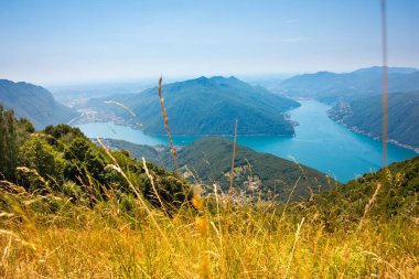 Beautiful big mountain lake with a bridge in Switzerland
