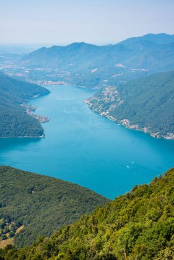 Beautiful big mountain lake with a bridge in Switzerland