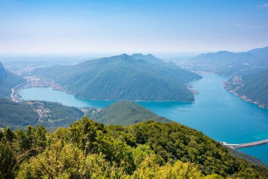 Beautiful big mountain lake with a bridge in Switzerland