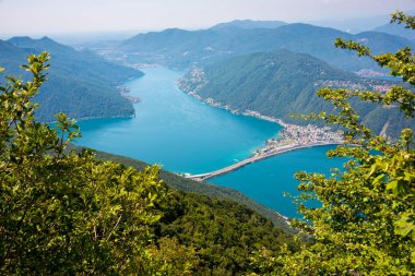 Beautiful big mountain lake with a bridge in Switzerland