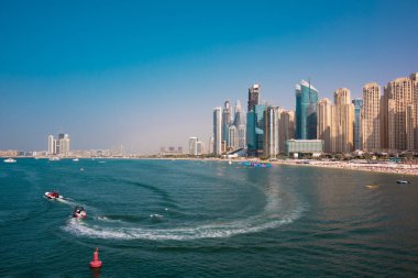 Dubai skyline, scyscraper modern district from water