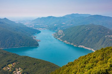 Beautiful big mountain lake with a bridge in Switzerland