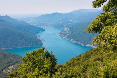 Beautiful big mountain lake with a bridge in Switzerland