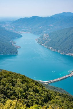 Beautiful big mountain lake with a bridge in Switzerland