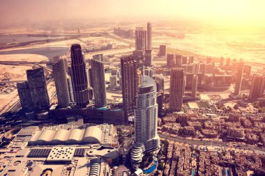 Dubai city seen from above, panoramic view of modern skyscraper buildings