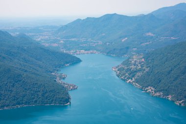 Beautiful big mountain lake with a bridge in Switzerland
