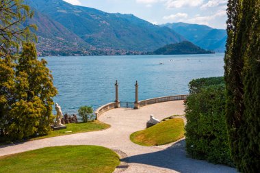 Lake Como. Natural landscape with trees and mountains by lake