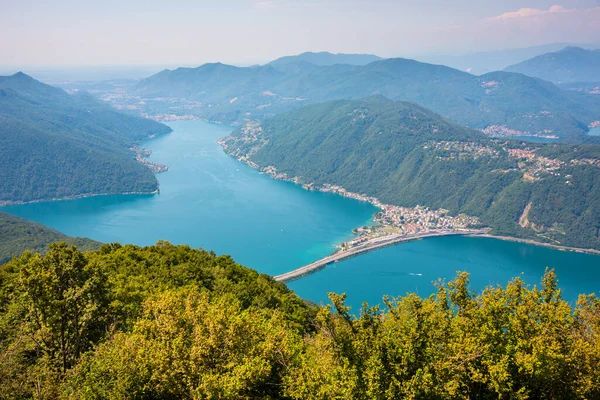 Beautiful big mountain lake with a bridge in Switzerland