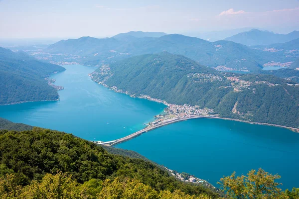 Beautiful big mountain lake with a bridge in Switzerland