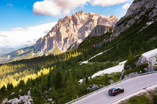 Dolomite alps in Italy, high mountain and green forest