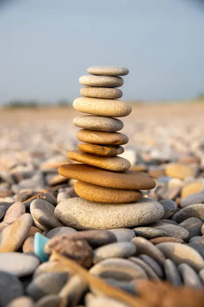 A stone pyramid, i.e. stacked stones on a beach, good for meditation. Well known in esotericism.