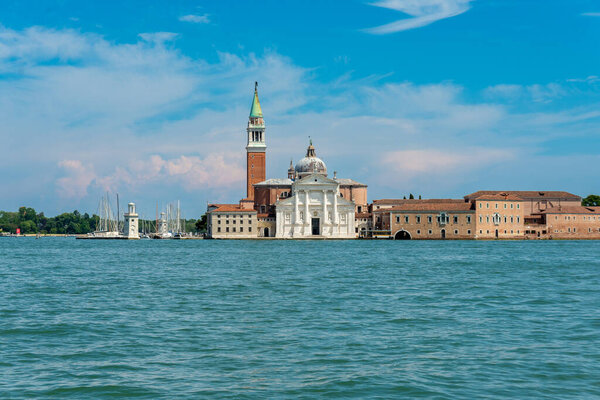 Venice, Veneto - Italy - 06-10-2021: San Giorgio Maggiore church rises against the sky on its namesake island in Venice