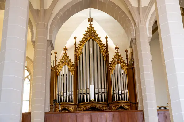 stock image Bautzen, Saxony - Germany - 04-10-2021: Majestic gothic pipe organ at St. Petri Cathedral framed by elegant white arches