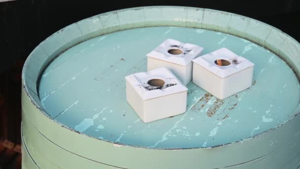 Three Ashtrays Still Containing Ashes Cigarette Butts Placed Turquoise Wooden — Stock Video