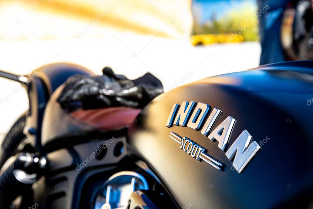 Reggio Calabria - Kalabrien - 05-18-2025: Close-up of the Indian Scout logo on a black motorcycle tank, taken during the Distinguished Gentlemans Ride in Reggio Calabria.