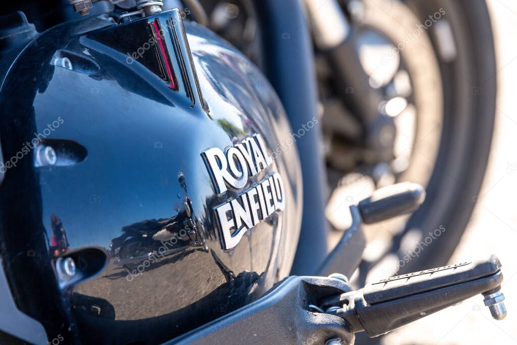 Reggio Calabria - Kalabrien - 05-18-2025: Close-up of a black Royal Enfield motorcycle tank with reflections, captured during the Distinguished Gentlemans Ride in Reggio Calabria, Italy.