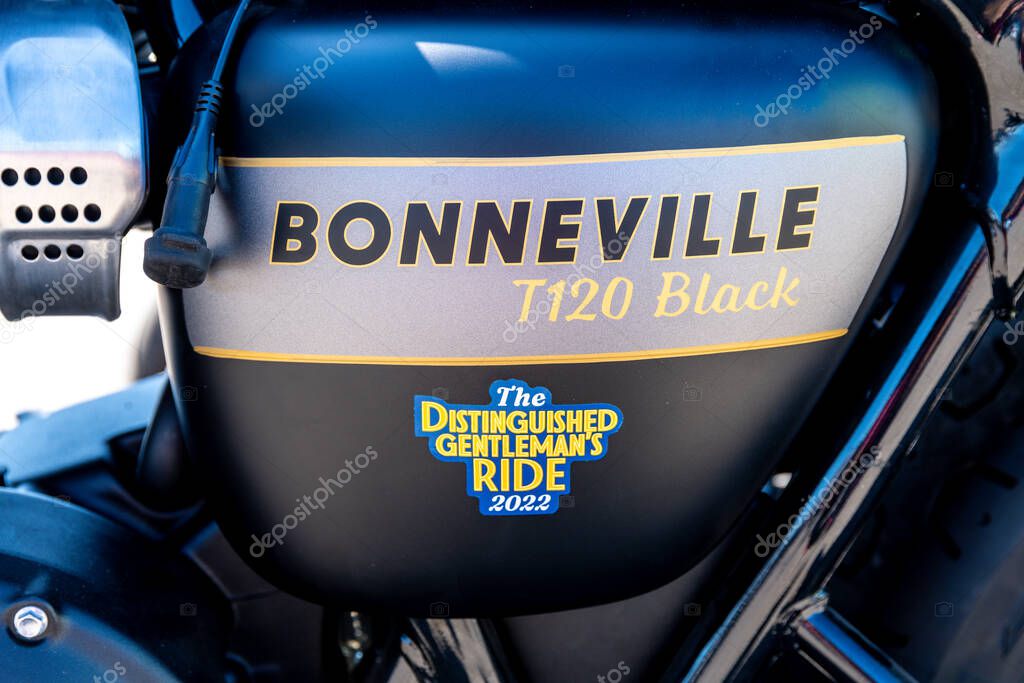 Reggio Calabria - Kalabrien - 05-18-2025: Close-up of a Triumph Bonneville T120 Black side panel with event logo, taken during the Distinguished Gentlemans Ride in Reggio Calabria.