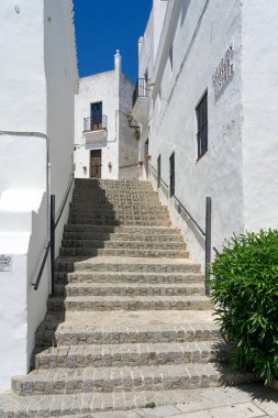 Beautiful street in the historical center of the white beautiful village of Vejer de la Frontera in a sunny day, Cadiz province, Andalusia, Spain