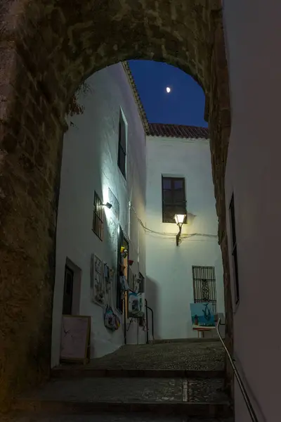 stock image VEJER DE LA FRONTERA, SPAIN - JULY 08, 2022: Beautiful street in the historical center of the white beautiful village of Vejer de la Frontera at twilight, Cadiz province, Andalusia, Spain