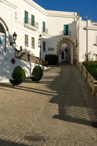 stock image Door of the village in the historical center of the white beautiful village of Vejer de la Frontera at sunrise, Cadiz province, Andalusia, Spain