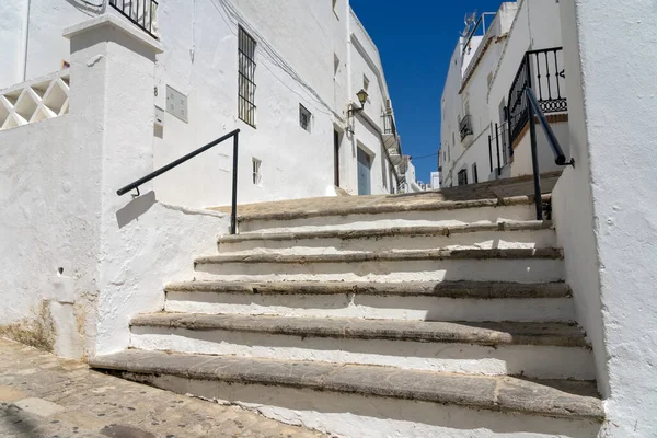 stock image Beautiful street in the historical center of the white beautiful village of Vejer de la Frontera in a sunny day, Cadiz province, Andalusia, Spain