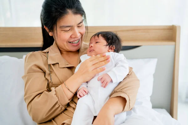 Close Asian Mother Hold Newborn Baby Sit Bed Bedroom Day — Stock Photo, Image