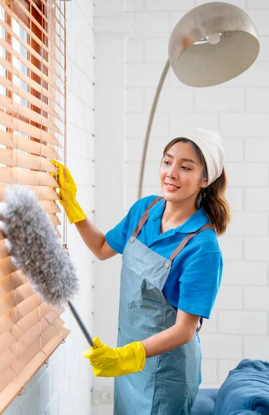 Vertical Image Asian Housekeeper Housemaid Use Feather Duster Clean Curtain — Stock Photo, Image