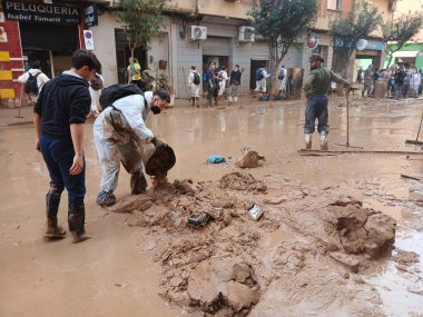 CATARROJA, SPAIN - NOVEMBER 9, 2024: View of devastating floods in Valencia caused by DANA torrential rains on October 29-30. The disaster has affected several towns, such as Catarroja and Paiporta. clipart