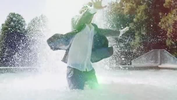 Young Man Water Having Fun Fountain — Stock Video
