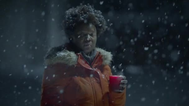 Black Female Person Curly Hair Holding Candlelight Snowy Winter Weather — Stok Video