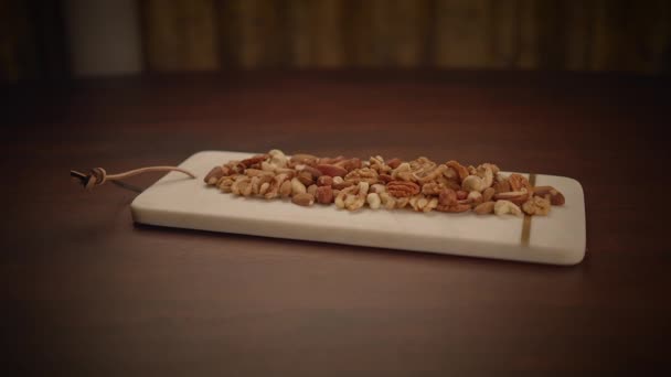 新鮮なオーガニックヘルシーなビーガンナットミックススナック食品栄養背景 — ストック動画