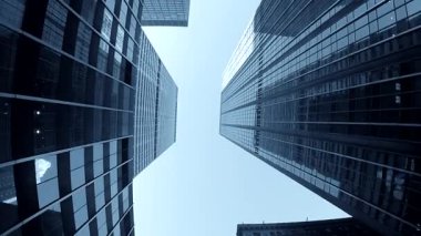 A breathtakingly stunning view showcasing towering skyscrapers set against a beautifully clear blue sky