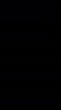 Göz kamaştırıcı bir şehrin silueti parlak bir alacakaranlık gökyüzüne karşı dimdik ayakta duruyor ve büyüleyici bir atmosfer yaratıyor.