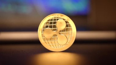 Parıldayan bir dalgalı para, kripto para piyasasında yeniliğin ve ilerlemenin güçlü bir sembolü olarak hizmet vermektedir.