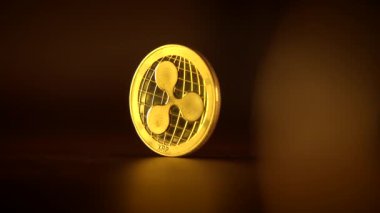 Parlak altın bir dalgalı kripto para güzel bulanık bir arka plan atmosferinde göze çarpar.