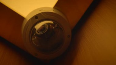 A sleek and modern surveillance camera is strategically placed to ensure optimal security in a contemporary setting
