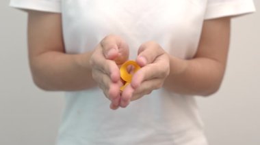 Yellow September, Suicide prevention day, Childhood, Sarcoma, bone and bladder cancer Awareness month, Yellow Ribbon for supporting people life and illness. Healthcare and World cancer day concept