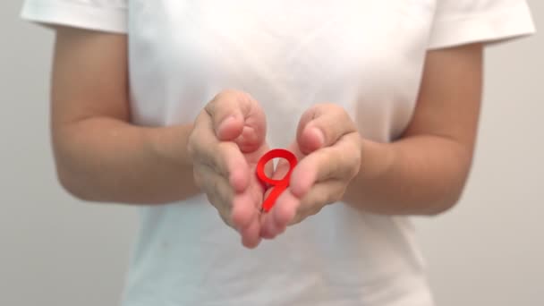 Main Tenant Ruban Orange Pour Leucémie Journée Cancer Rein Monde — Video