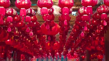 Chinese red Lanterns in temple, happy Lunar New Year holiday. Chinese sentence means happiness, healthy, Lucky and Wealthy