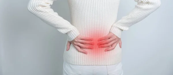 woman having back pain. Urinary system and Stones, Cancer, world kidney day, Chronic kidney stomach, liver pain and pancreas concept