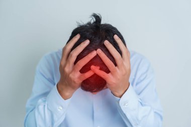 man having headache. stressed, Migraine, World Brain Tumor day, Brain Stroke, Dementia, alzheimer, parkinson and world mental health concept